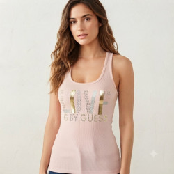 Stylové růžové tílko G by Guess Taja s kamínky a žebrovaným střihem na tělo. Pohodlný a elegantní kousek pro každodenní nošení.